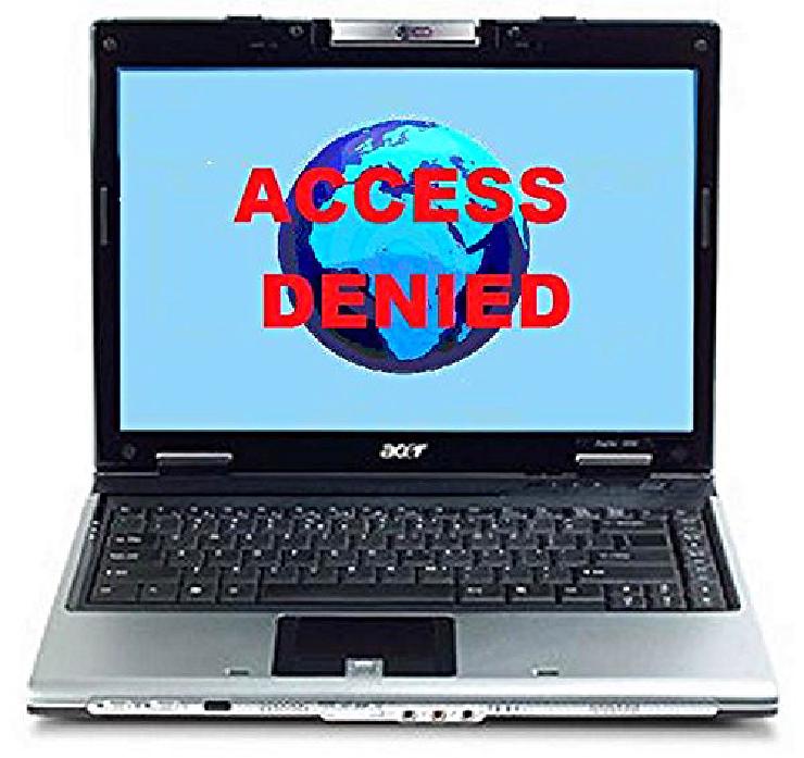 laptop with the words &ldquo;access denied&rdquo; over a globe displaying on the screen